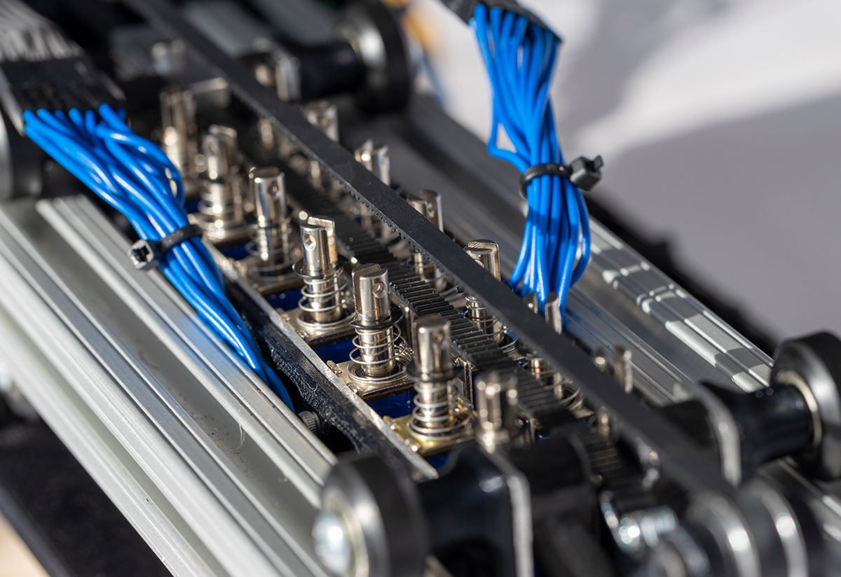 Picture of the solenoids inside of the printer, which punch the dots into the paper